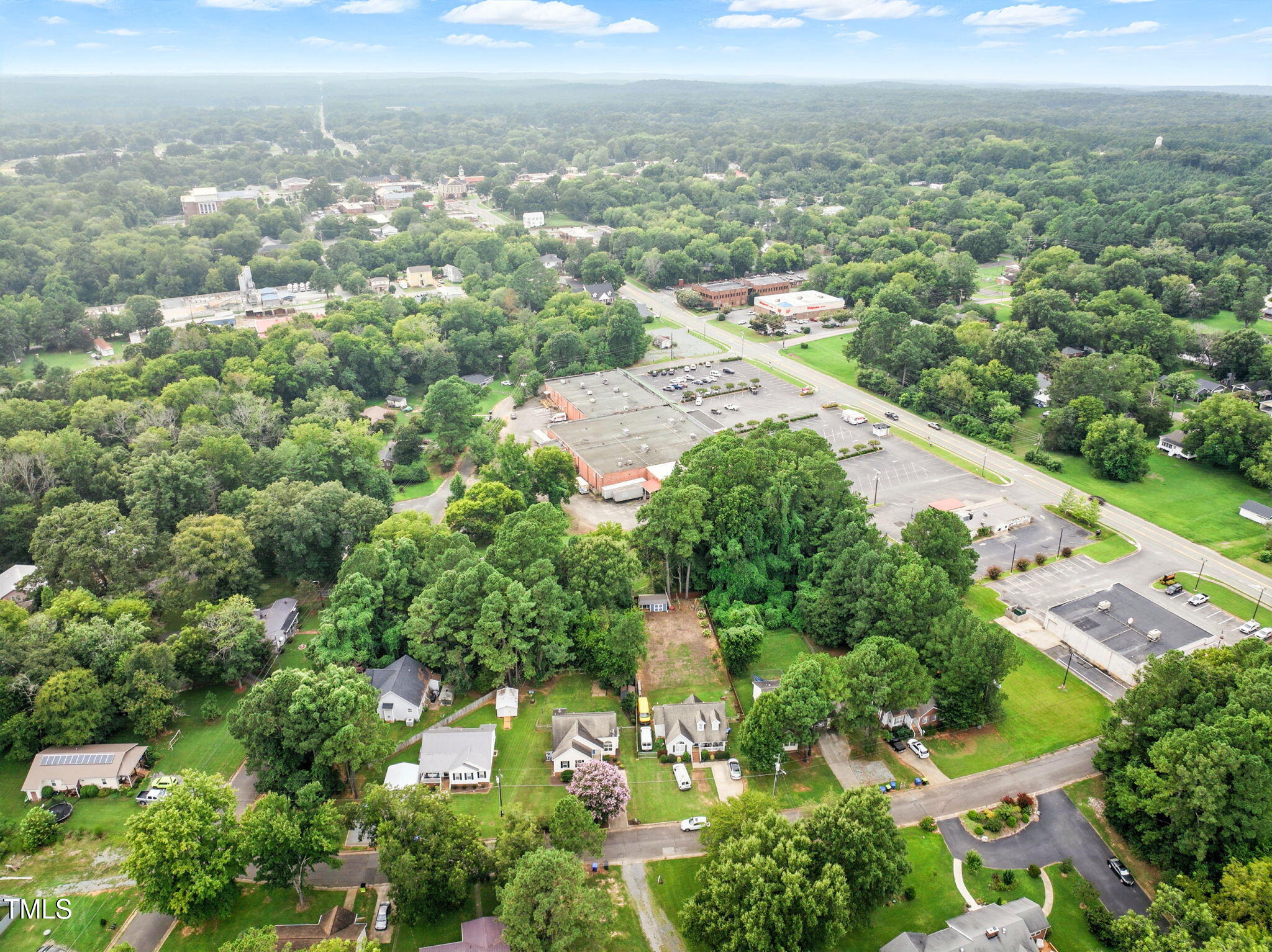 243 Toomer Loop Road Pittsboro, NC 27312 - Photo 9 of 42 an aerial view of multiple house