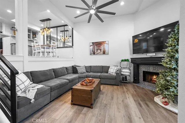 a kitchen with kitchen island a counter top space a sink stainless steel appliances and cabinets