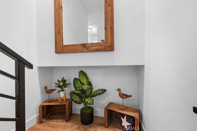 a bedroom with a bed and a chair