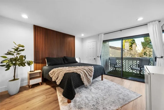 a bathroom with a shower and a sink