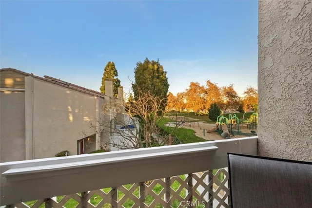 a front view of a house with a yard and a garage
