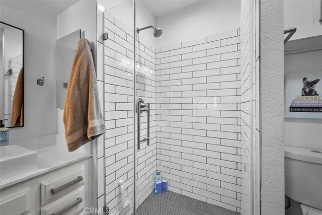 a view of backyard with outdoor seating and green space