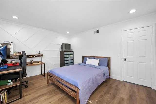 an aerial view of residential houses with outdoor space and river