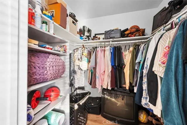 a view of a house with roof deck and seating space