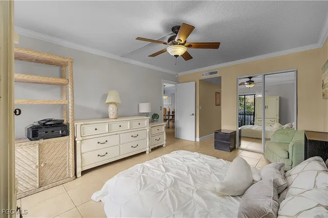 a spacious bathroom with a granite countertop sink mirror and a shower