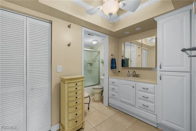 a bathroom with a shower and toilet