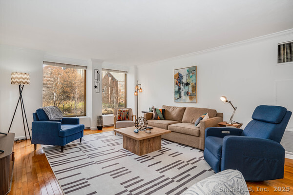 1 Gold Street, Unit 3D Hartford, CT 06103 - Photo 15 of 25 a living room with furniture and a large window