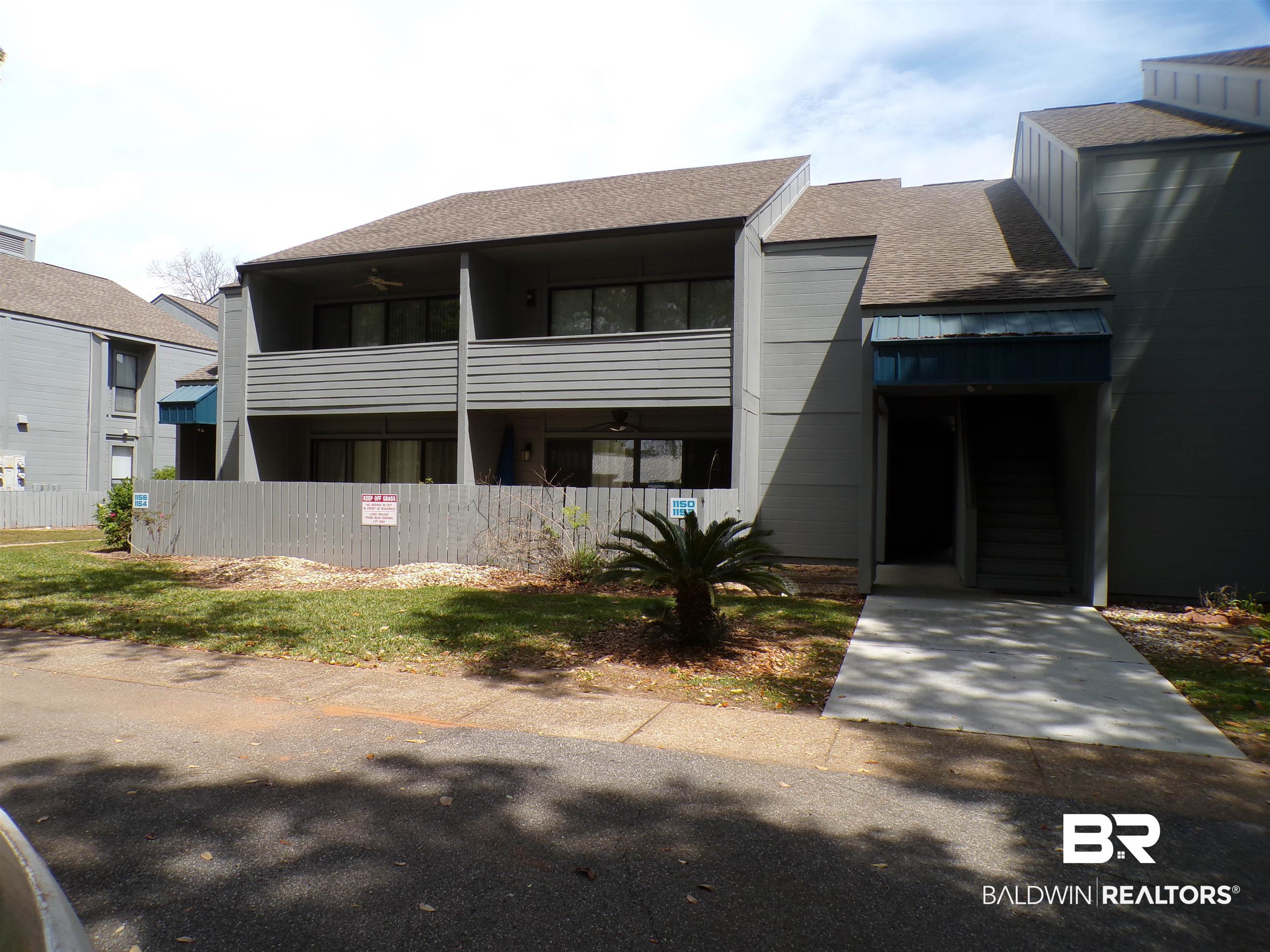 1152 North Alston Street, Unit 1152 Foley, AL 36535 - Photo 2 of 16 View of front facade featuring a shingled roof