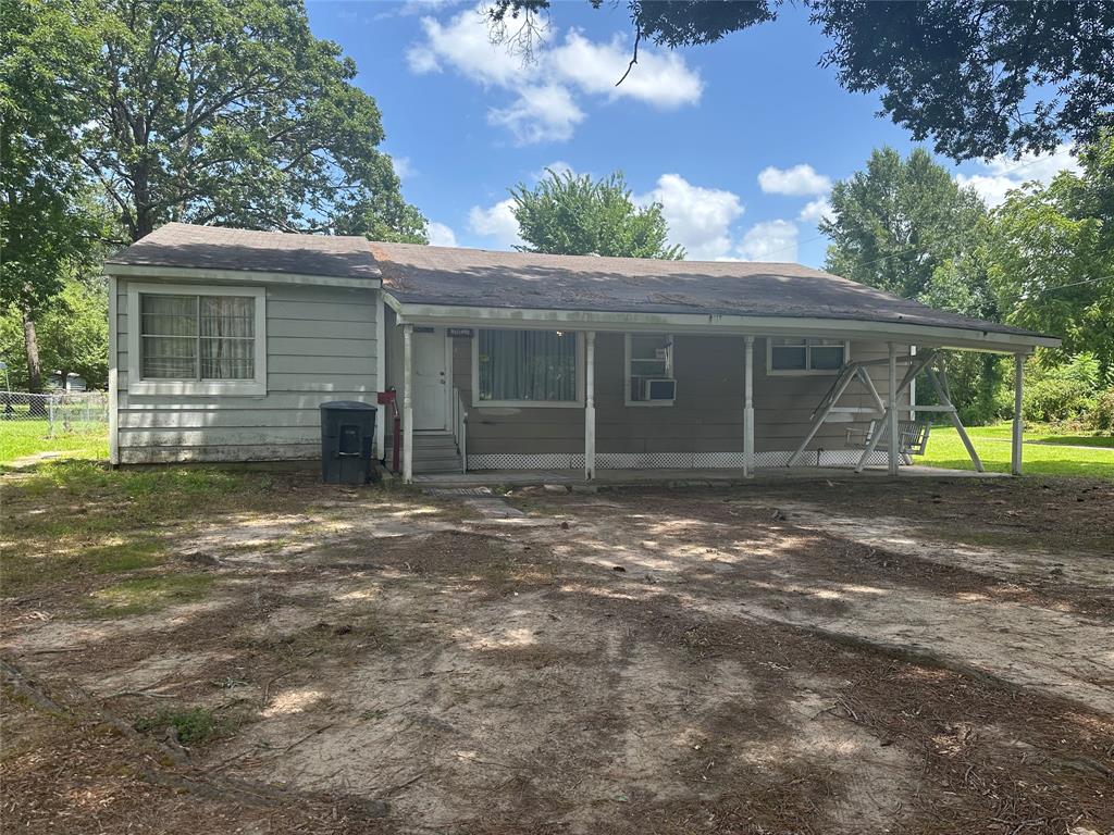 7341 Broadacres Road Shreveport, LA 71129 - Photo 1 of 23 a view of a house with a yard and a large tree