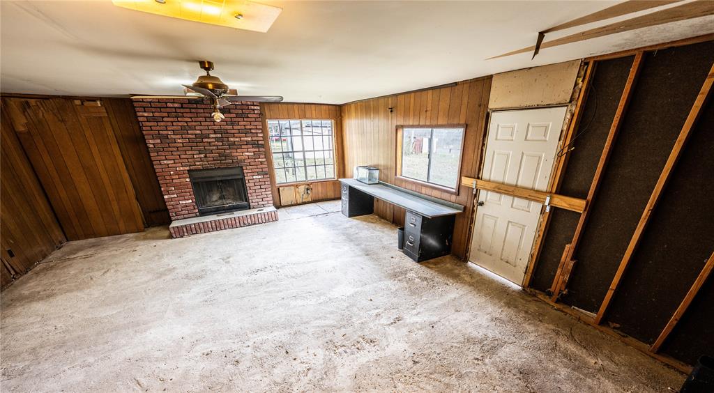 7341 Broadacres Road Shreveport, LA 71129 - Photo 17 of 23 a view of an empty room with a fireplace