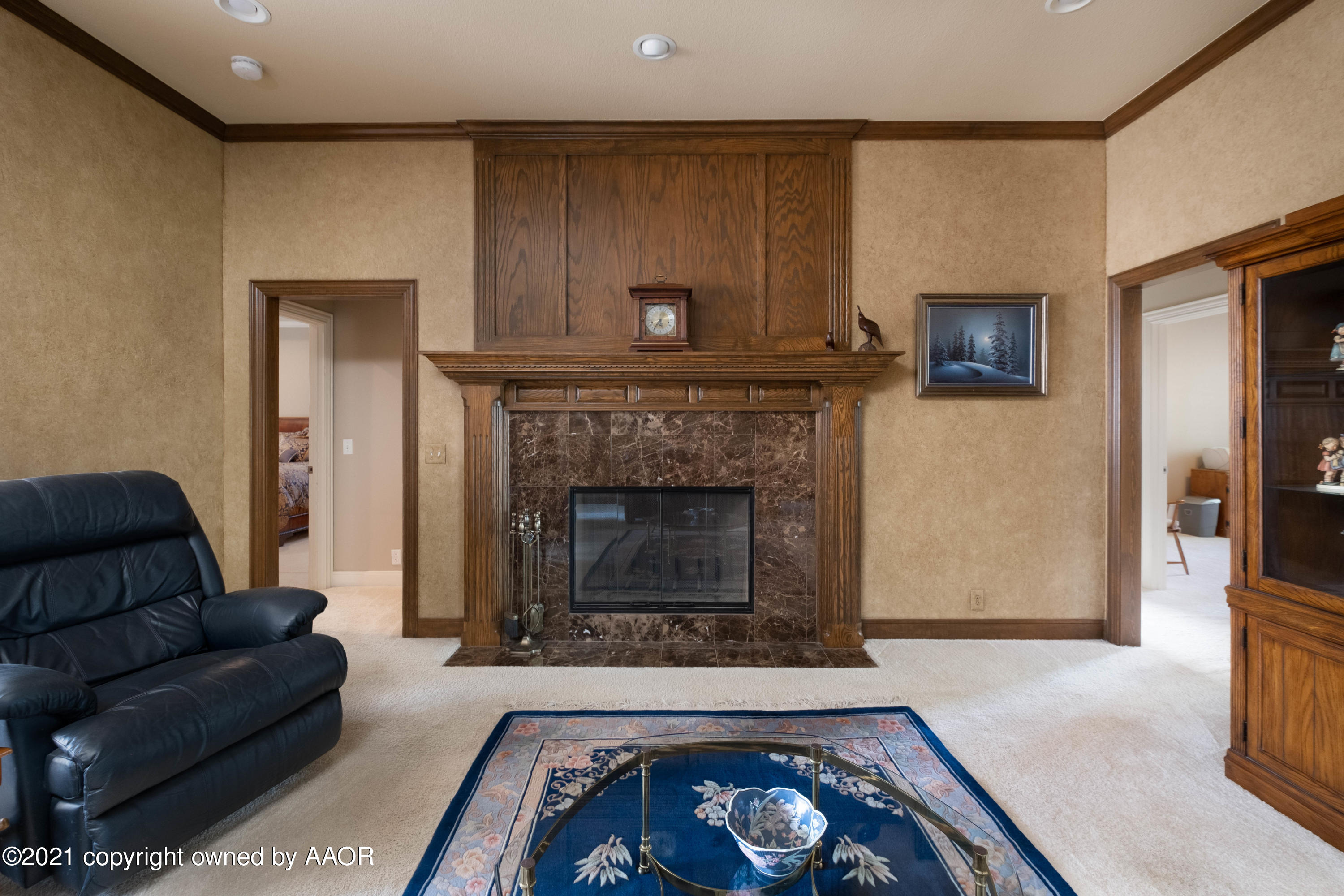 6607 Sumac Place Amarillo, TX 79124 - Photo 13 of 32 a living room with furniture and a fireplace