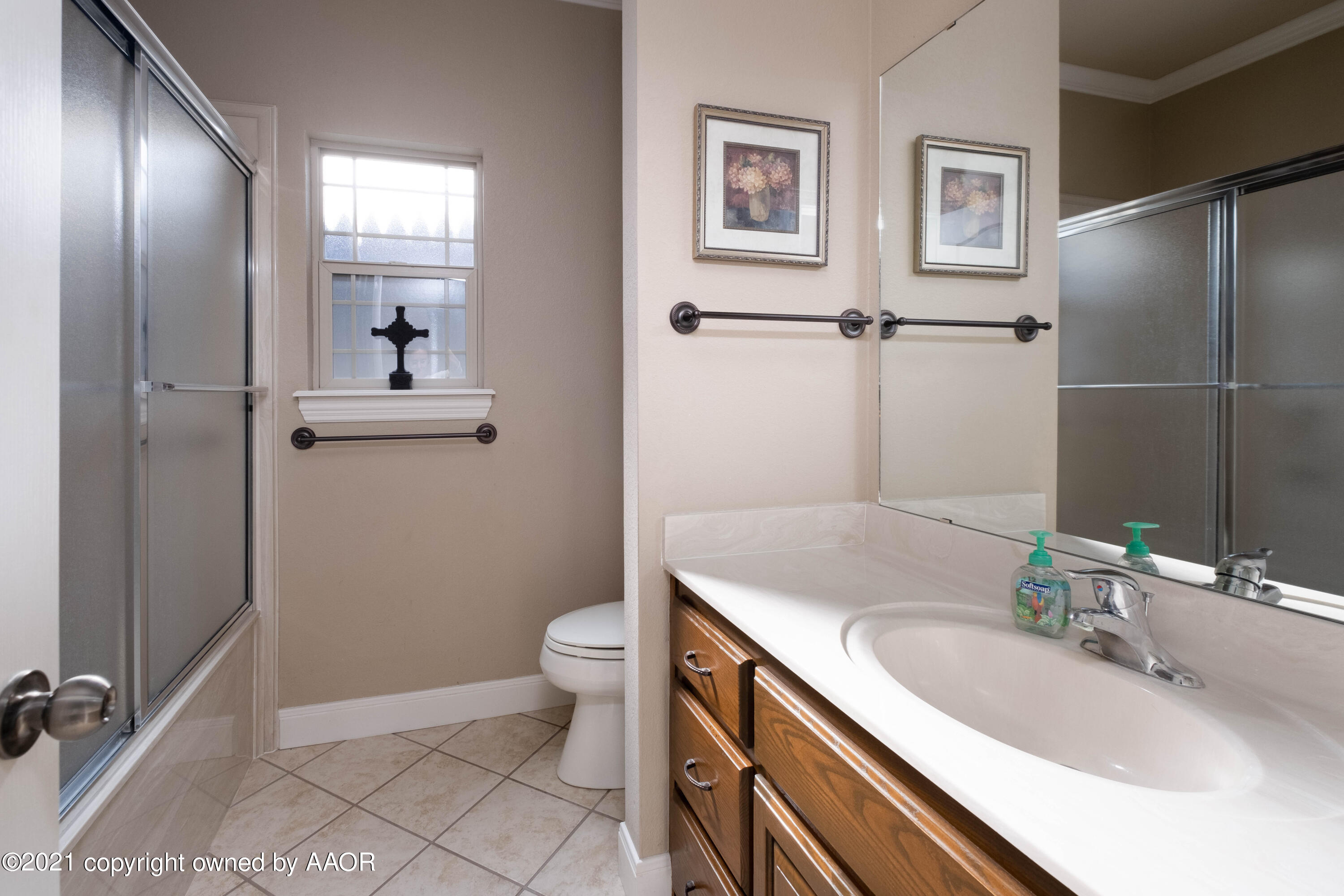 6607 Sumac Place Amarillo, TX 79124 - Photo 26 of 32 a bathroom with a granite countertop sink toilet and shower