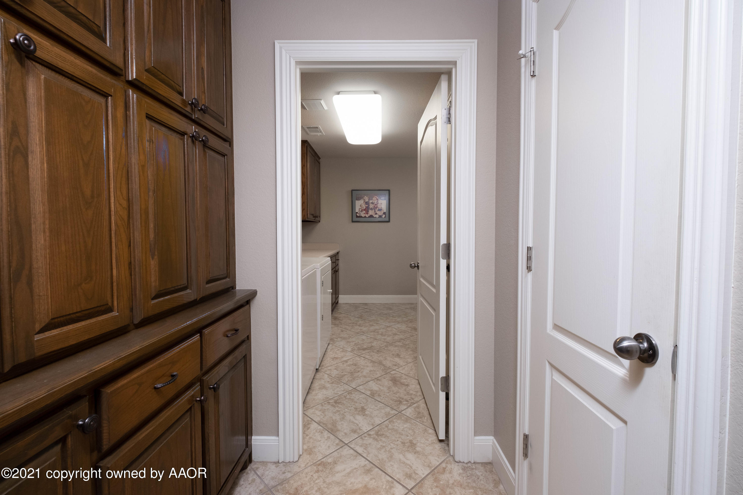6607 Sumac Place Amarillo, TX 79124 - Photo 27 of 32 a view of a kitchen from the hallway