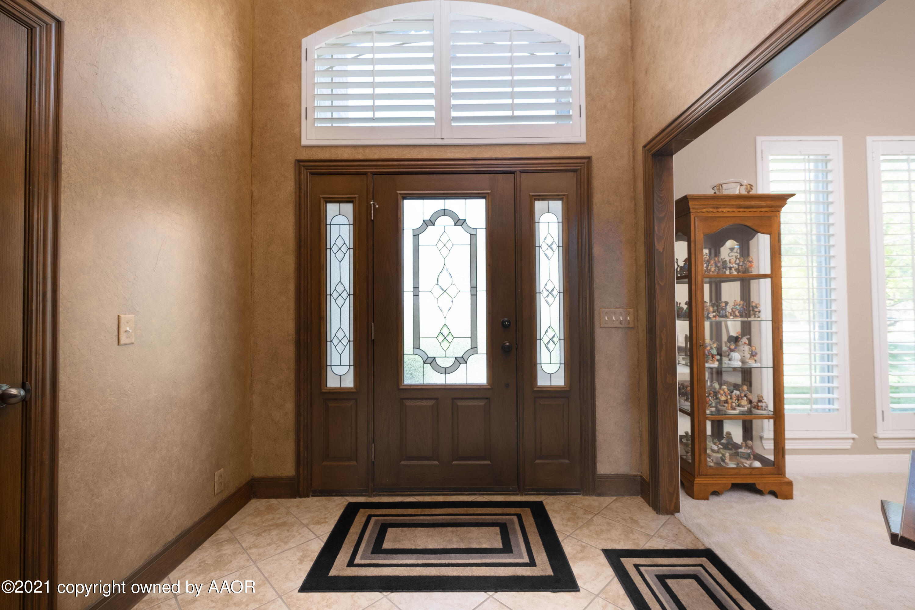 6607 Sumac Place Amarillo, TX 79124 - Photo 4 of 32 a view of a door and wooden floor