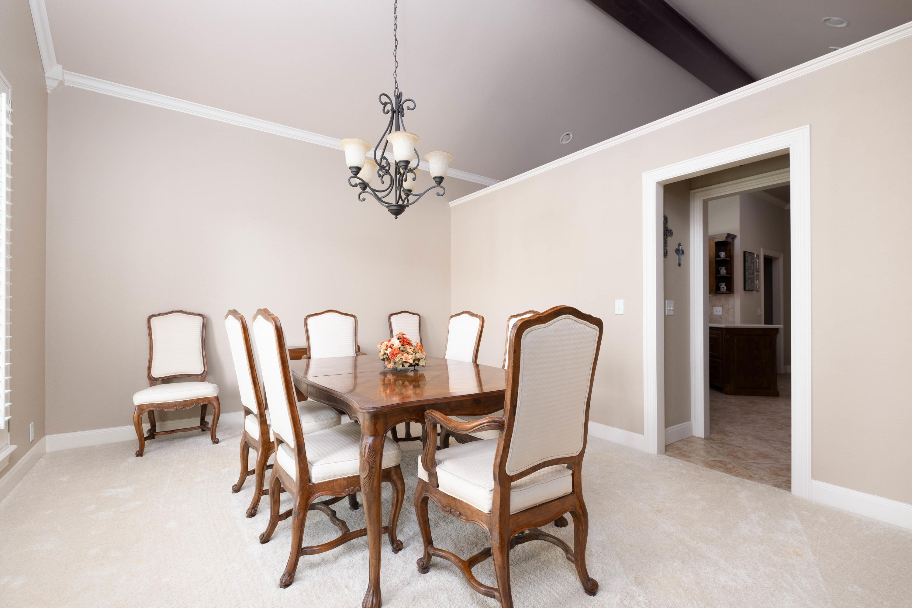 6607 Sumac Place Amarillo, TX 79124 - Photo 5 of 32 a dining room with furniture and a chandelier