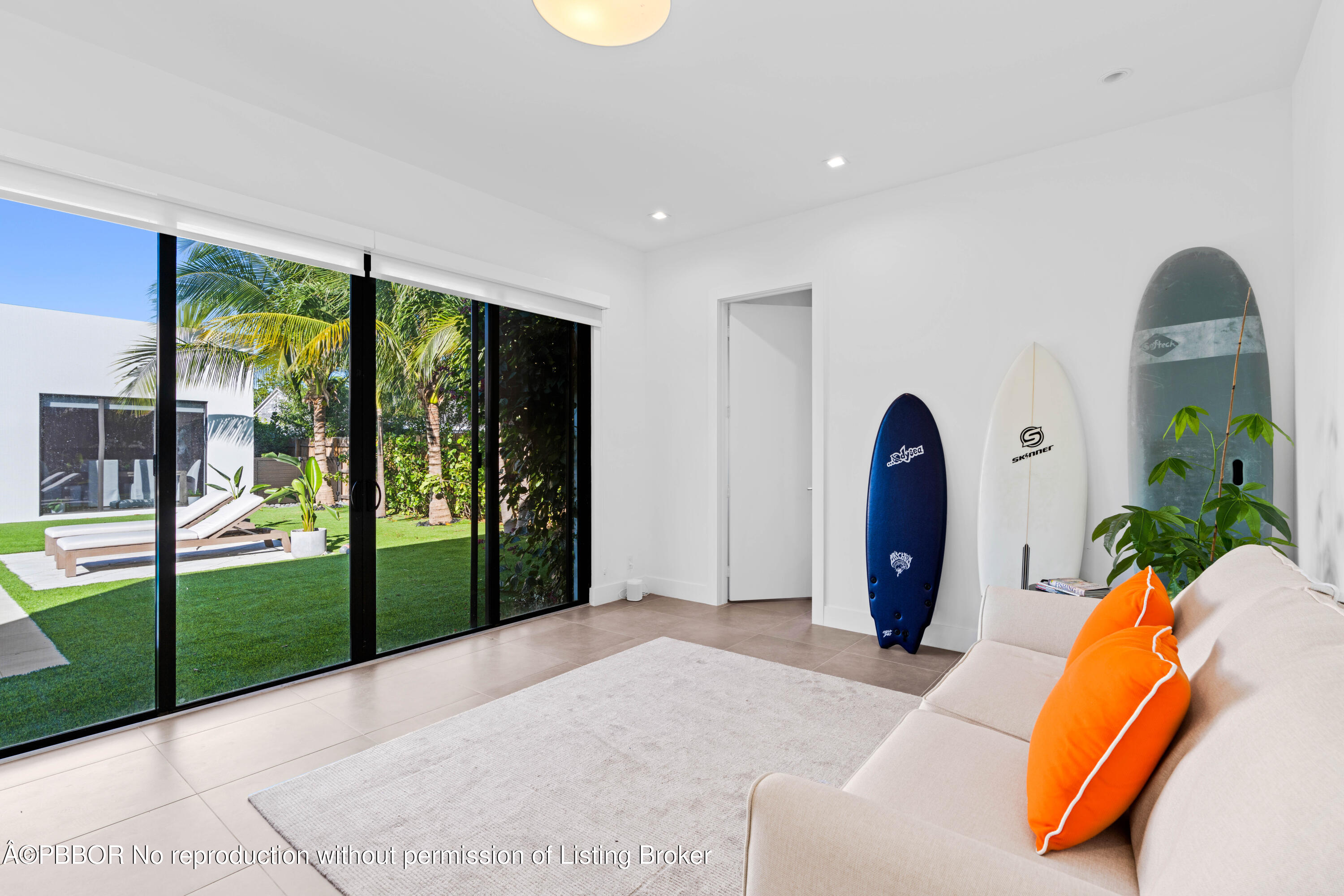 230 Seville Road West Palm Beach, FL 33405 - Photo 21 of 25 a bed room with a bed and sliding door