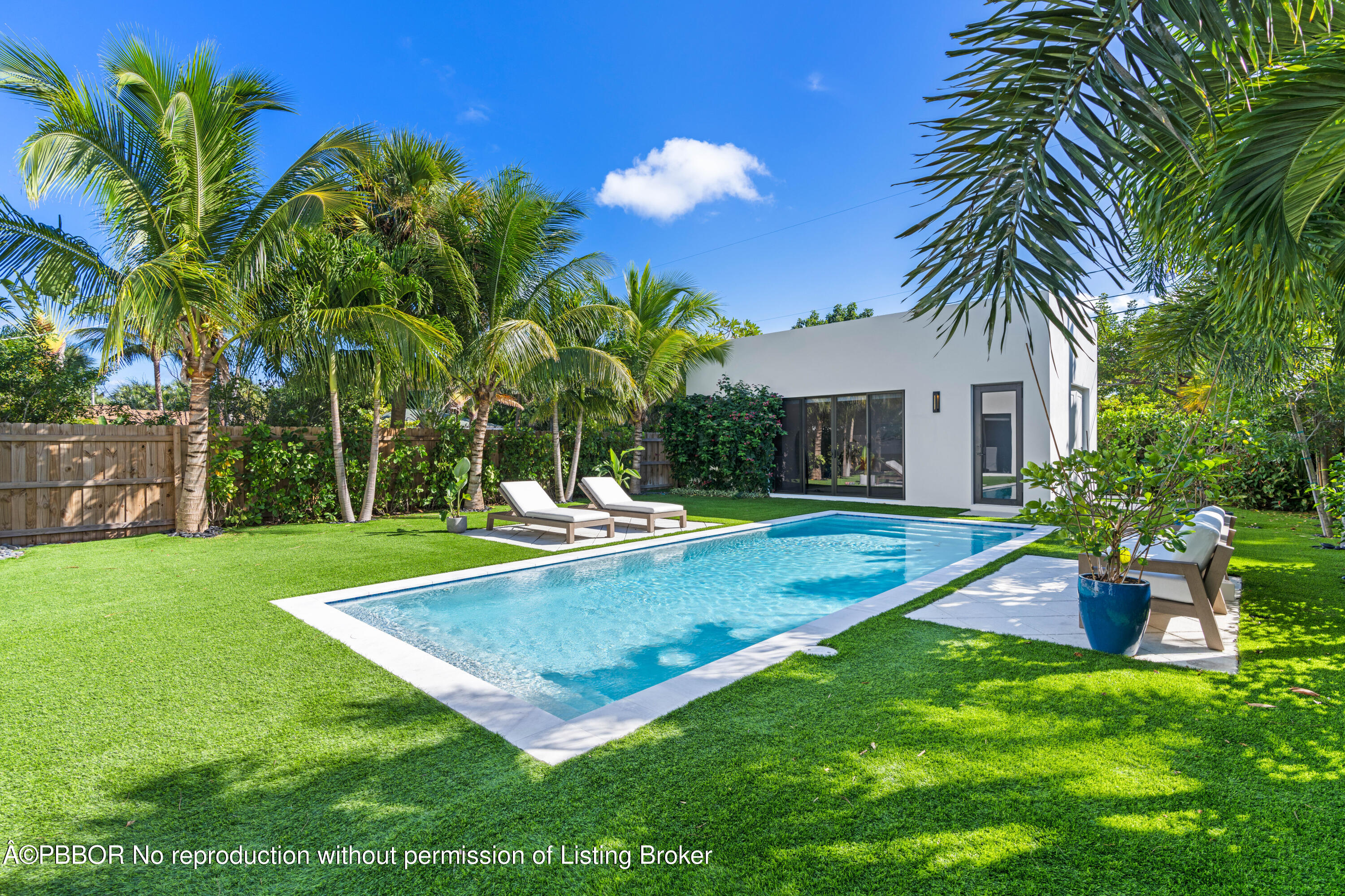 230 Seville Road West Palm Beach, FL 33405 - Photo 7 of 25 a view of a backyard with a garden and plants
