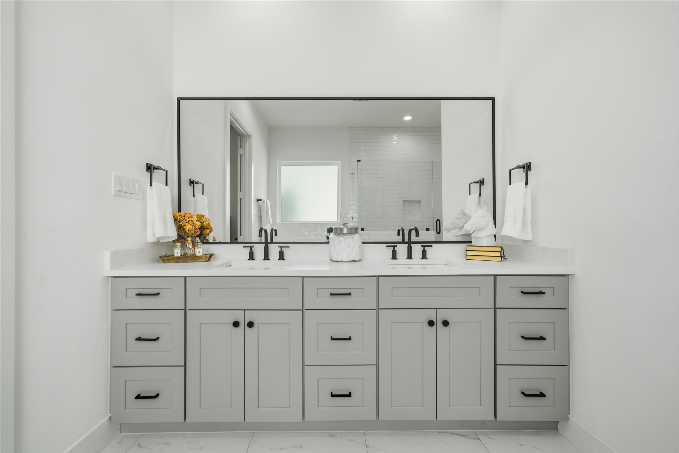 1307 East 27th Street Houston, TX 77009 - Photo 23 of 33 a bathroom with a double vanity sink double and a mirror
