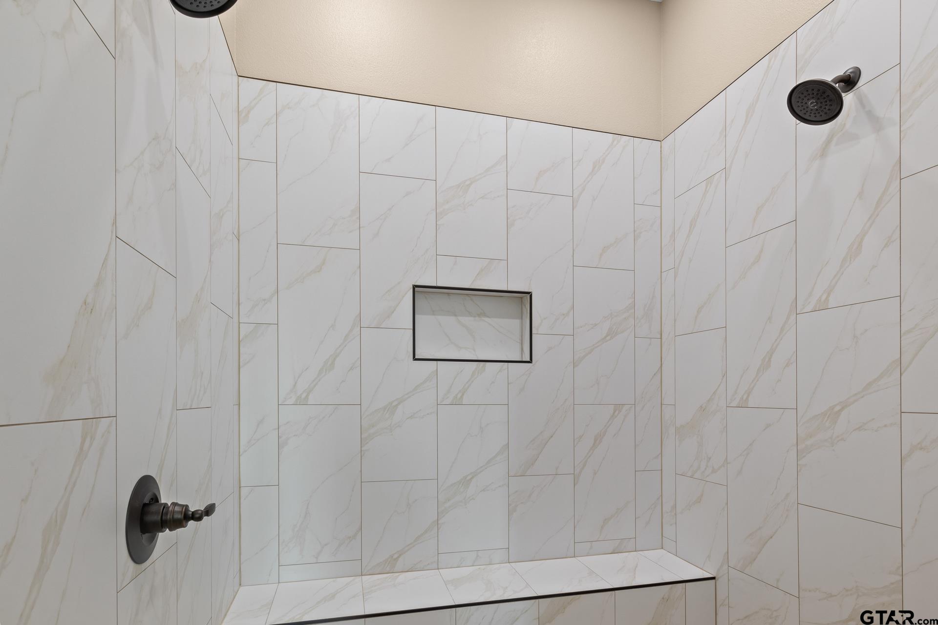 1003 Stone Haven Mount Pleasant, TX 75455 - Photo 16 of 41 a bathroom with a shower