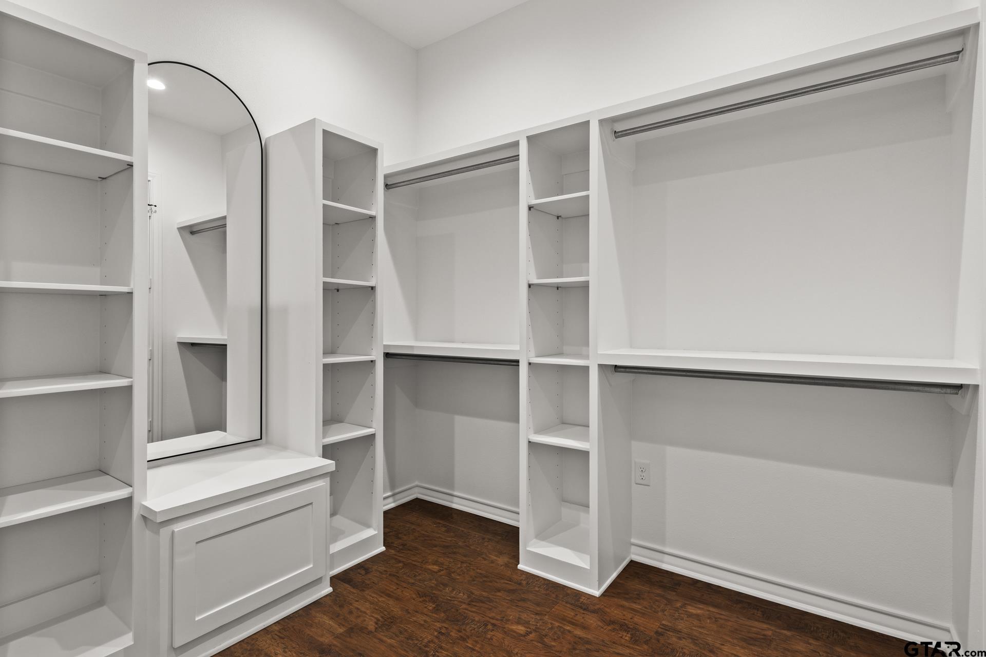 1003 Stone Haven Mount Pleasant, TX 75455 - Photo 19 of 41 a view of walk in closet with empty racks
