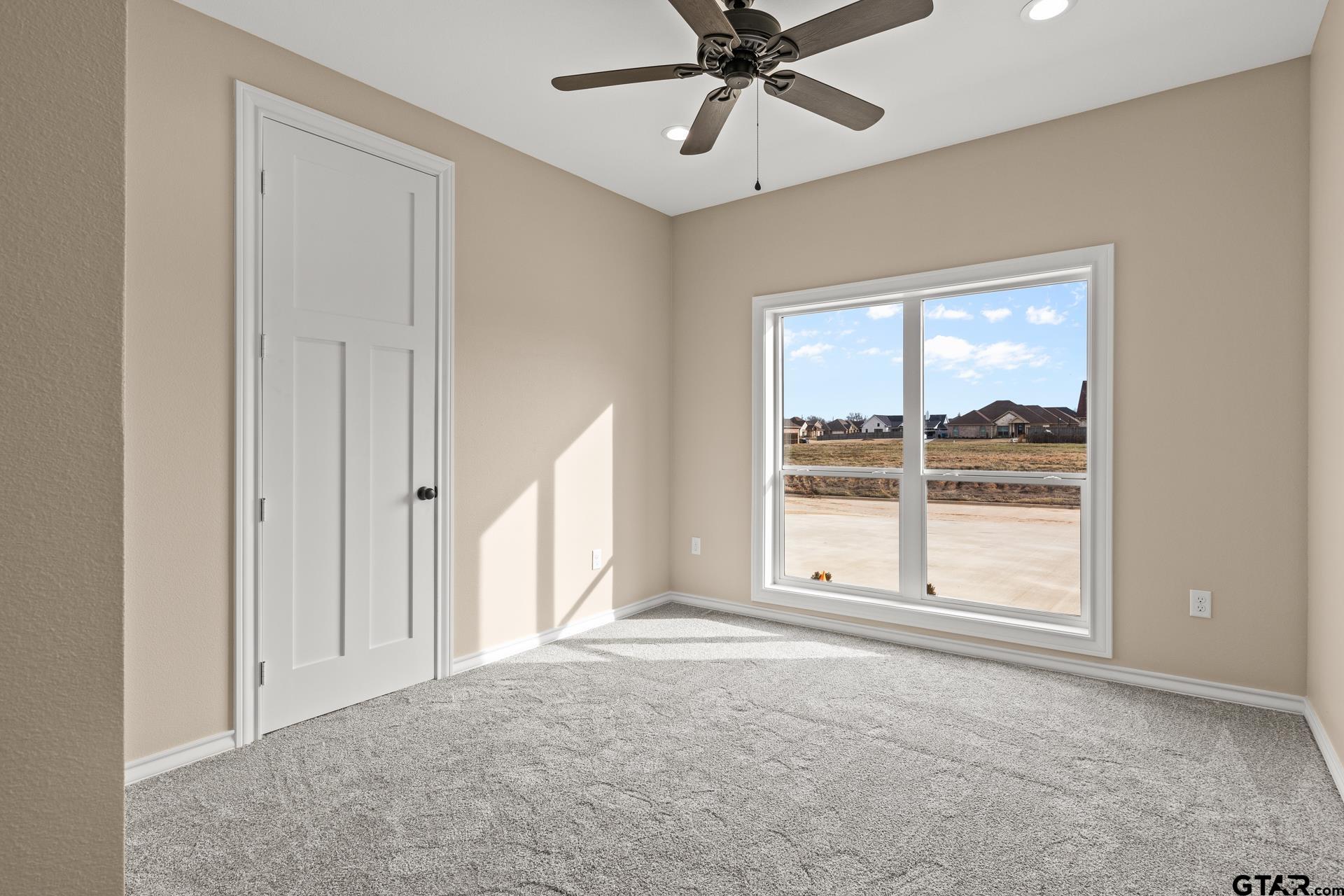 1003 Stone Haven Mount Pleasant, TX 75455 - Photo 21 of 41 a view of an empty room with a window