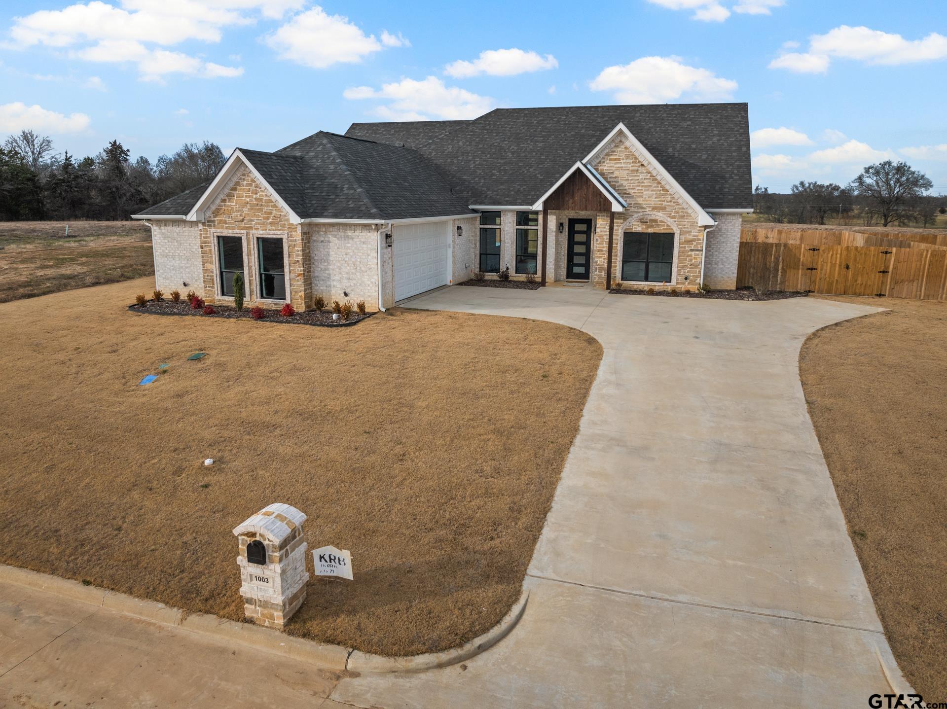 1003 Stone Haven Mount Pleasant, TX 75455 - Photo 36 of 41 a view of a house with backyard