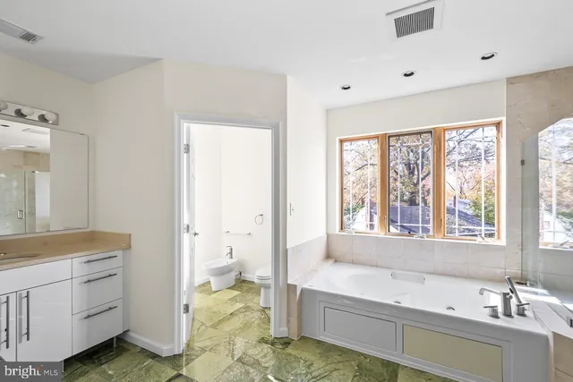a view of a livingroom with furniture and wooden floor