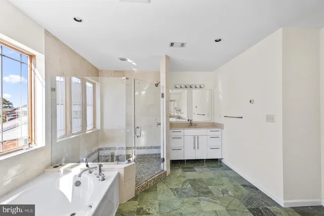 a view of a livingroom with furniture and wooden floor
