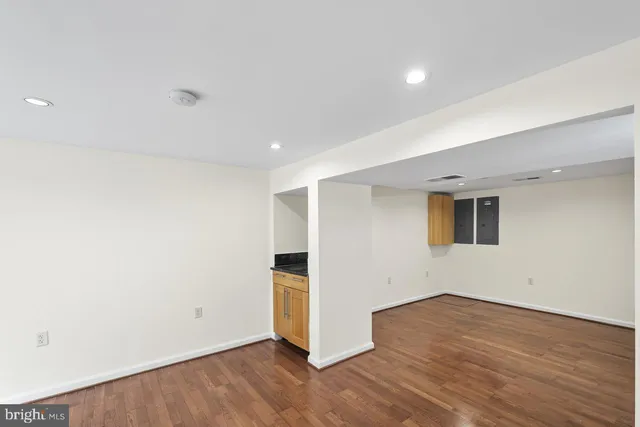 a view of a livingroom with furniture and a fireplace