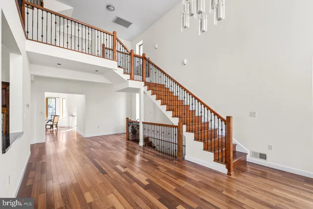 a view of entryway with wooden floor