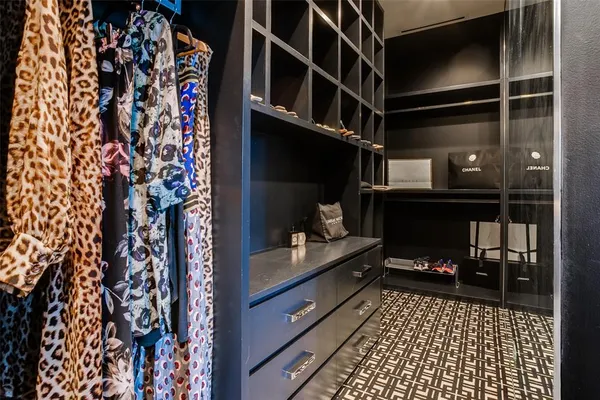 a view of hallway with stairs and wooden floor
