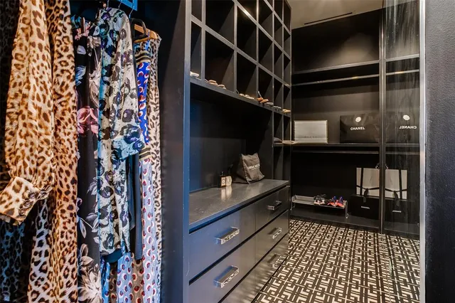 a view of hallway with stairs and wooden floor