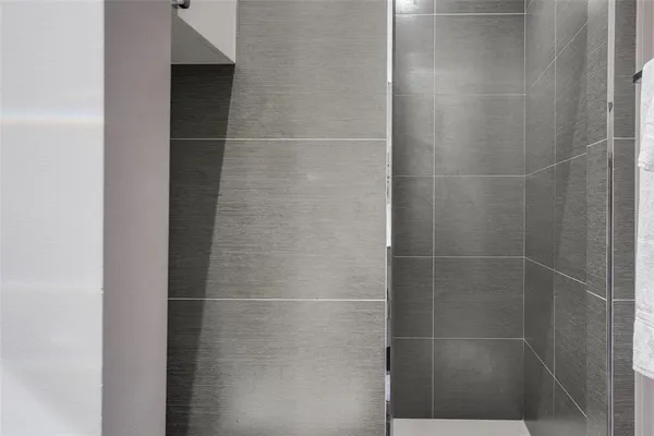 a white bath tub sitting in a bathroom