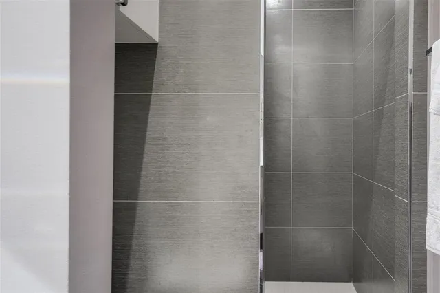 a white bath tub sitting in a bathroom