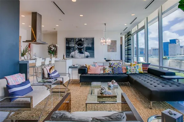 a living room with furniture and a table