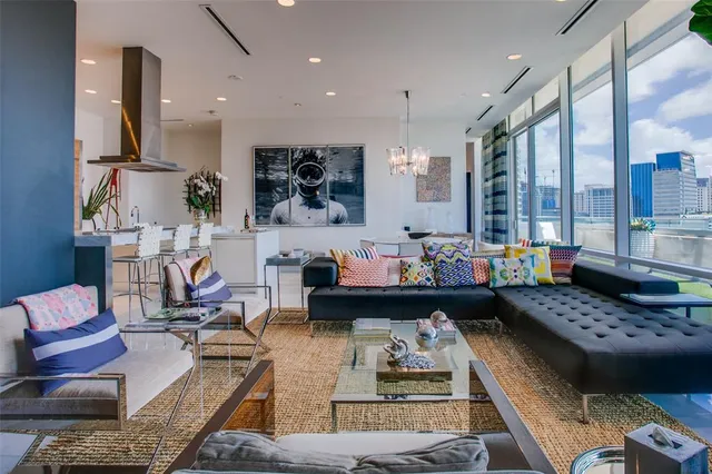 a living room with furniture and a table