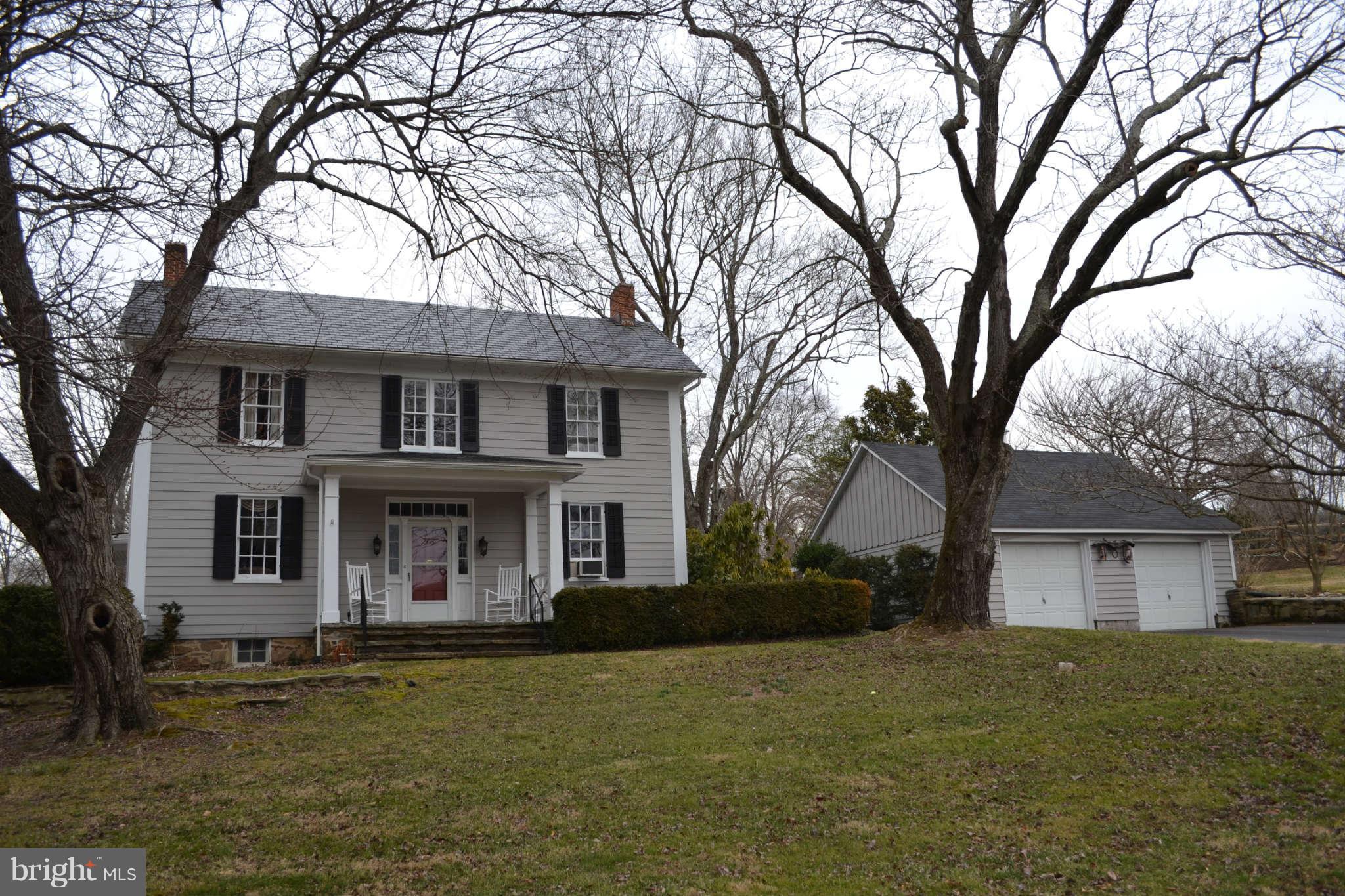 0 Cooper Road Phoenix, MD 21131 - Photo 1 of 30 a front view of a house with a garden