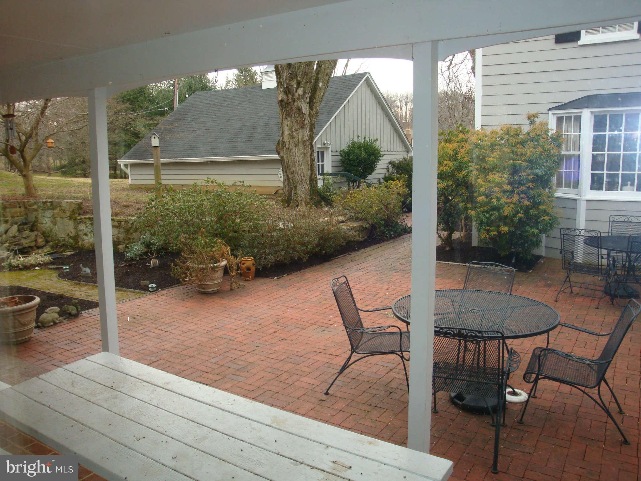 0 Cooper Road Phoenix, MD 21131 - Photo 18 of 30 a view of a patio with table and chairs and potted plants