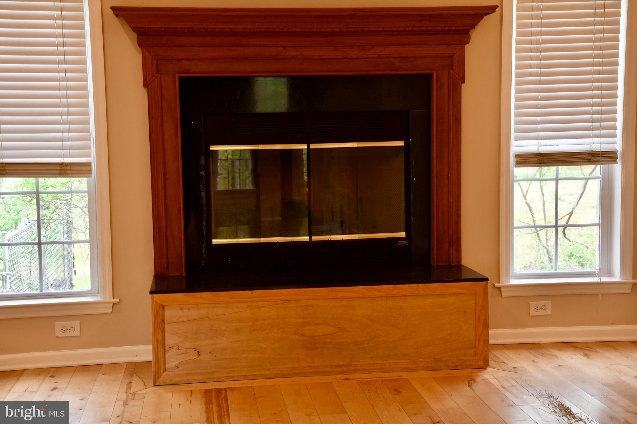 2138 Barrison Point Road Baltimore, MD 21221 - Photo 22 of 64 Wood Burning Fireplace in Family Room