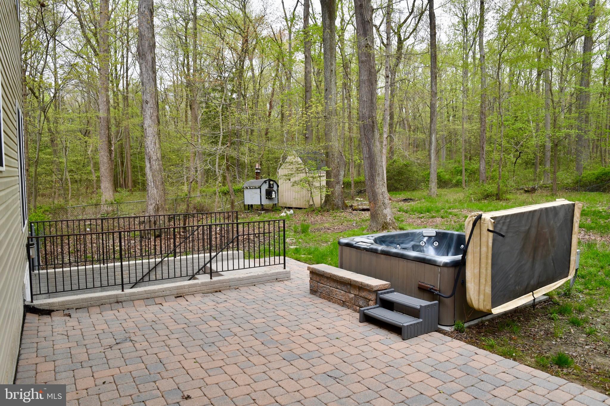 2138 Barrison Point Road Baltimore, MD 21221 - Photo 57 of 64 Back View with Brick Patio & Hot Tub