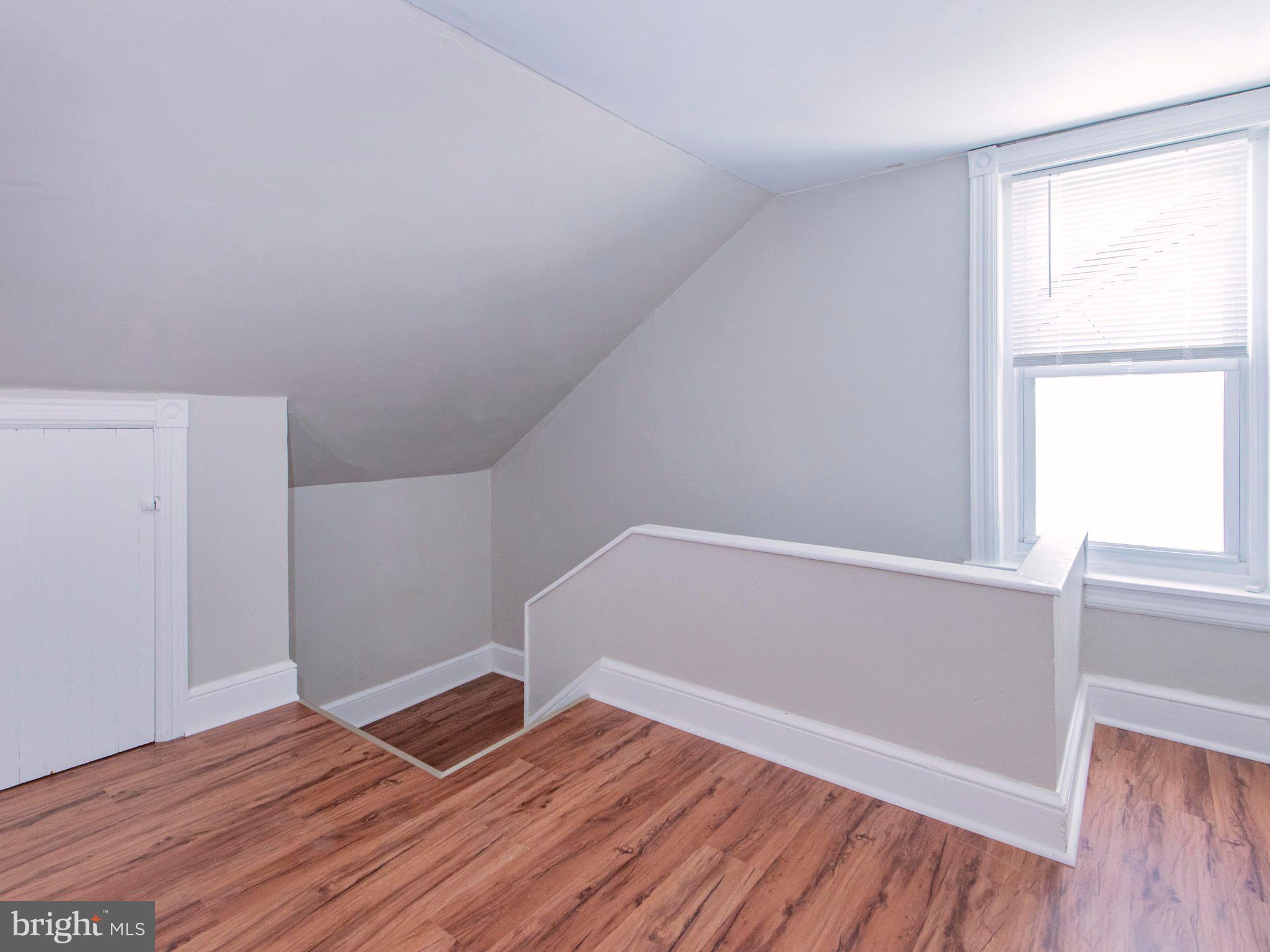 14 West 3rd Street, Unit 2 Pottstown, PA 19464 - Photo 12 of 13 a view of wooden floor and windows in a room