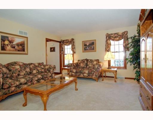 7000 Franklin Road Seven Fields, PA 16046 - Photo 3 of 14 Living Room. Lovely formal living room with plush carpet and appealing stained wood work.