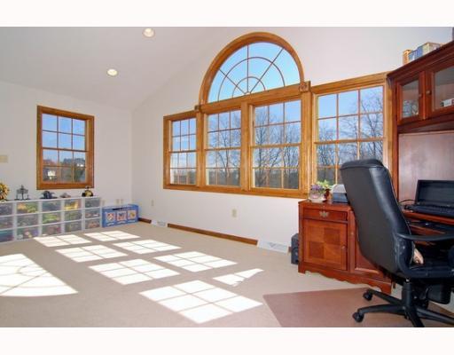 7000 Franklin Road Seven Fields, PA 16046 - Photo 7 of 14 Den/Family/Great Room. Fabulous first floor den/playroom with vaulted ceiling, recessed lighting and dramatic palladium window.