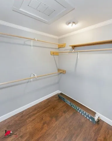 a view of a room with racks on the wall