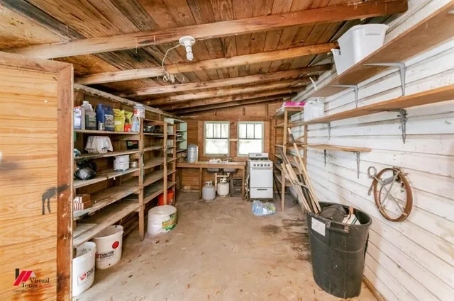 a view of a park with large trees