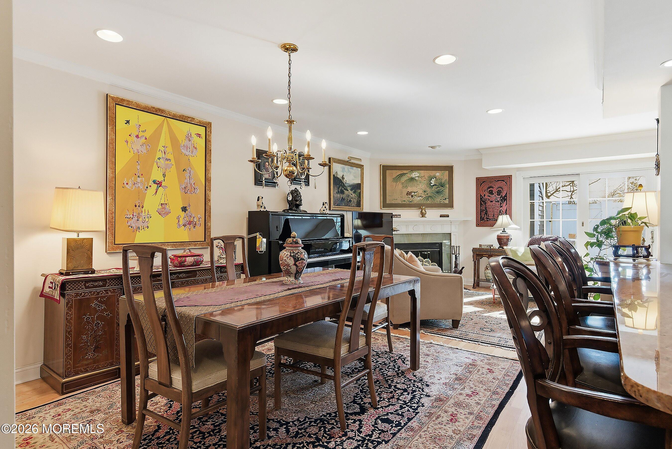 29 Rambling Meadow Court Tinton Falls, NJ 07724 - Photo 13 of 29 a view of a dining room with furniture window and wooden floor