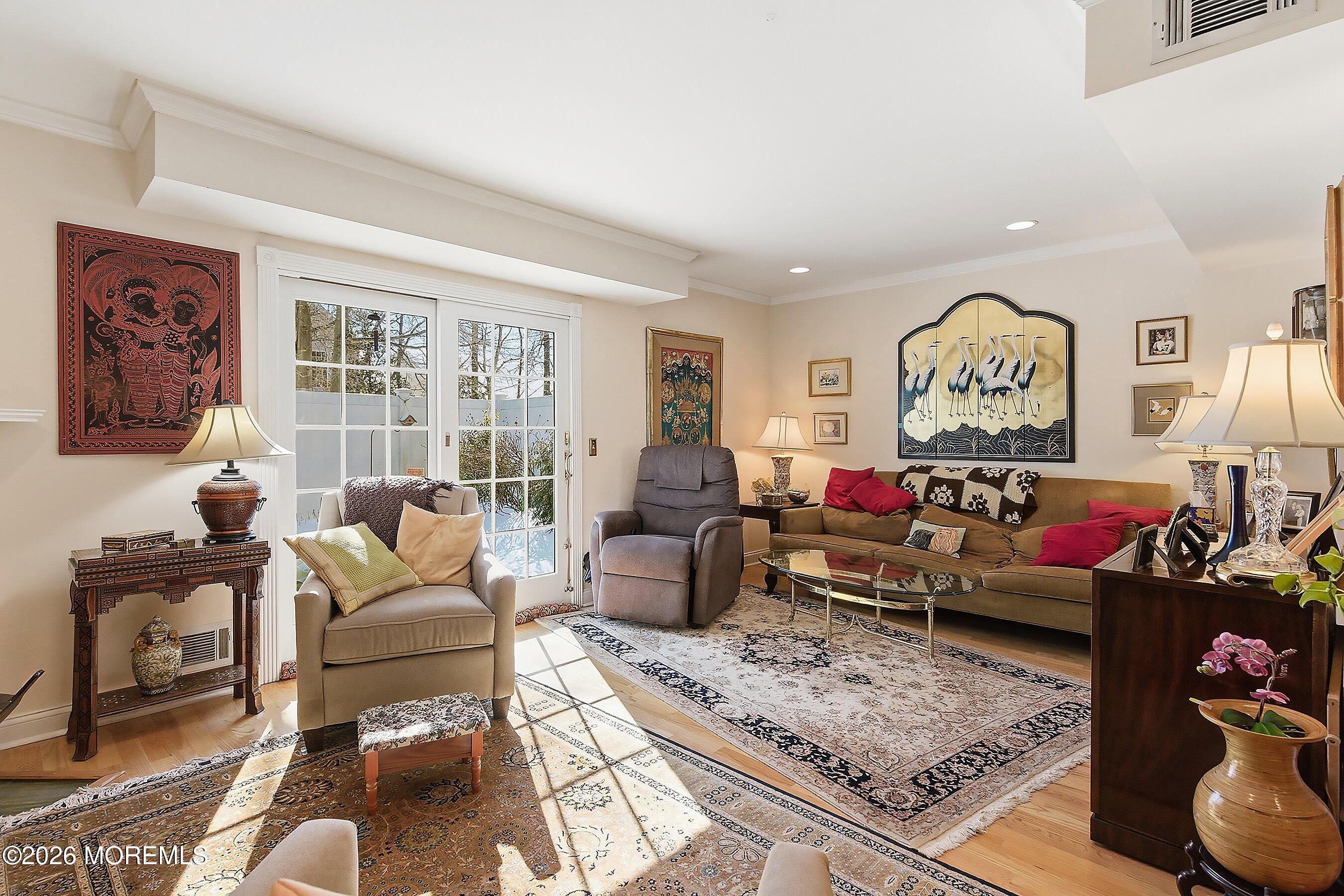 29 Rambling Meadow Court Tinton Falls, NJ 07724 - Photo 14 of 29 a living room with furniture and a large window