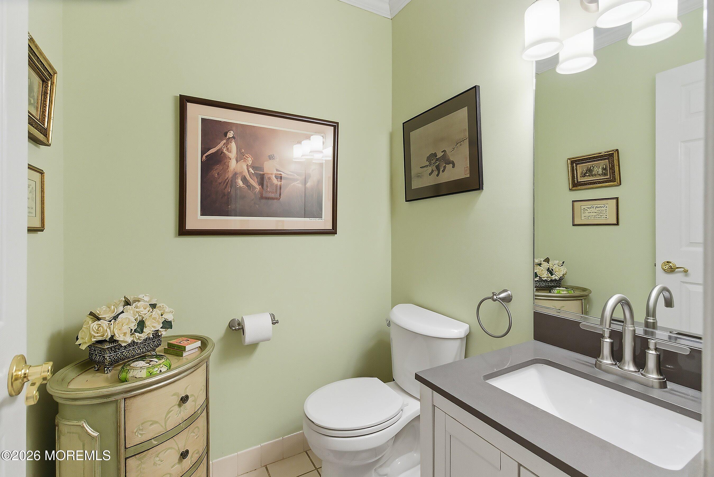 29 Rambling Meadow Court Tinton Falls, NJ 07724 - Photo 17 of 29 a bathroom with a toilet sink and mirror