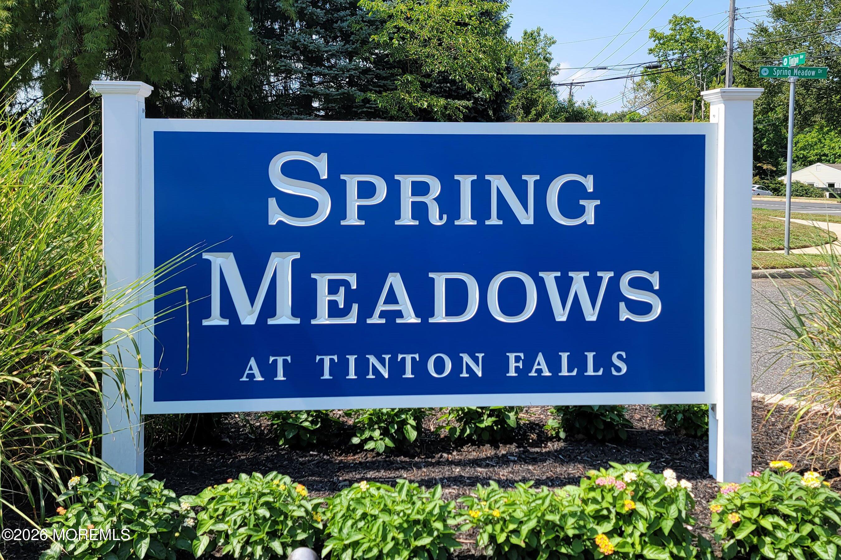 29 Rambling Meadow Court Tinton Falls, NJ 07724 - Photo 2 of 29 a sign that is on the wooden wall