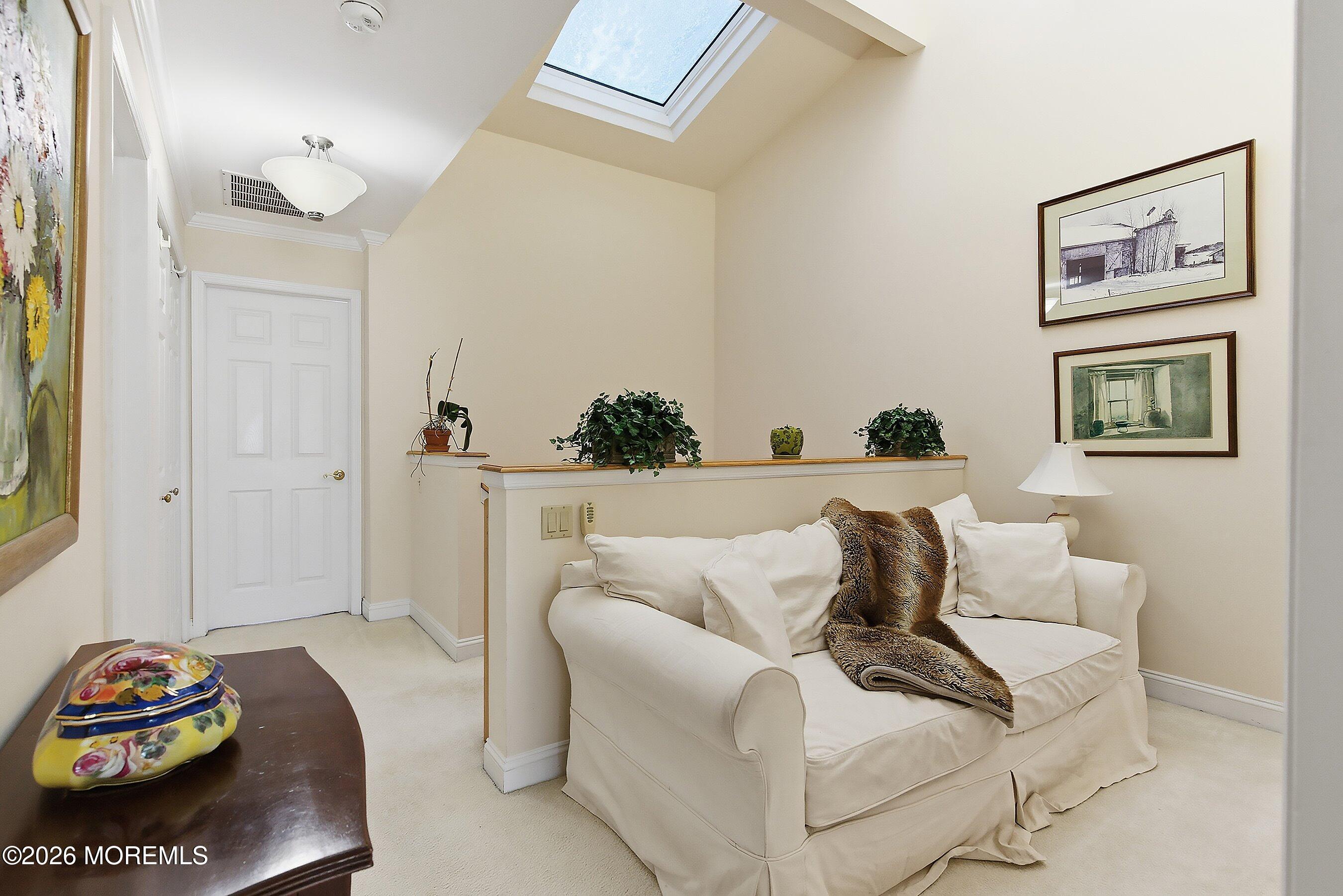 29 Rambling Meadow Court Tinton Falls, NJ 07724 - Photo 21 of 29 a living room with furniture and a table